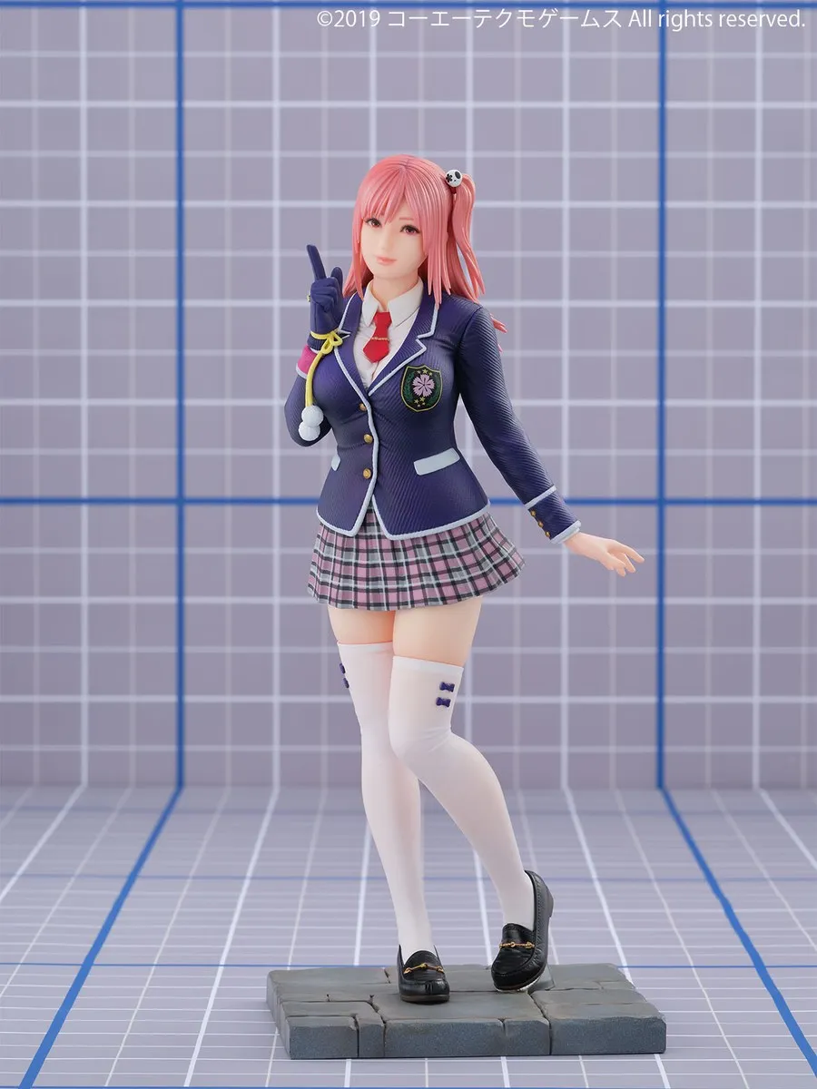 Kaiyodo 1/7 scale Honoka from Dead or Alive 6 in her school blazer and plaid skirt, one finger raised, standing on a stone-pavement base, official product photo