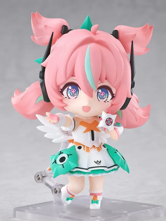 Nendoroid Aria from Zenless Zone Zero, a pink-twintailed character in a white and mint stage outfit with small wings, holding a star-shaped microphone, official Good Smile product photo